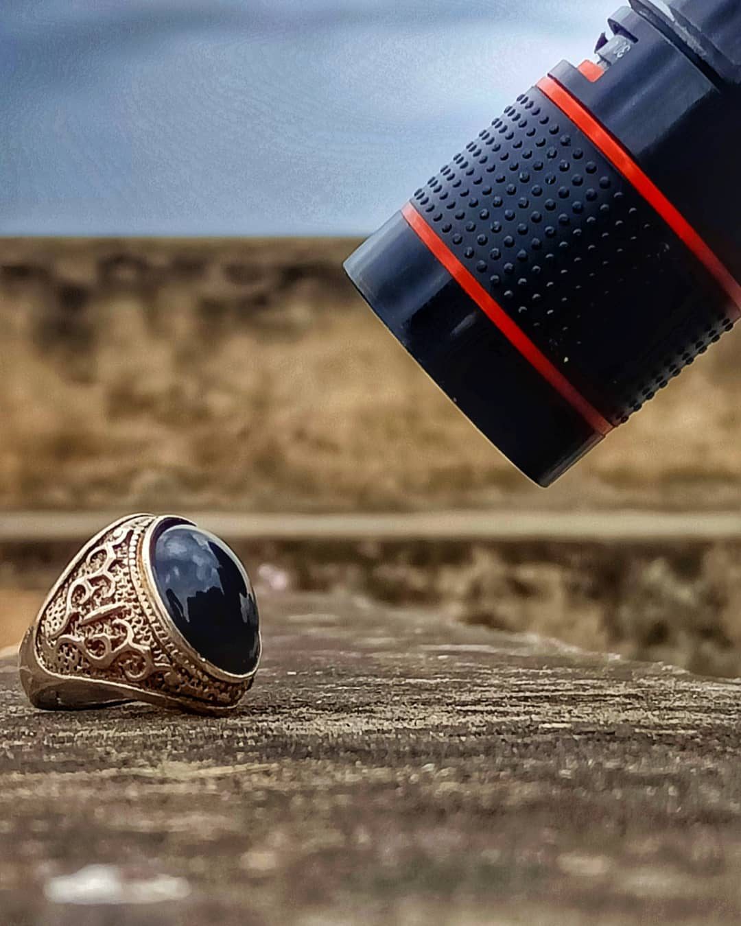 Lens, Ring, Ledge — macro photograph by Muhammad Azeem