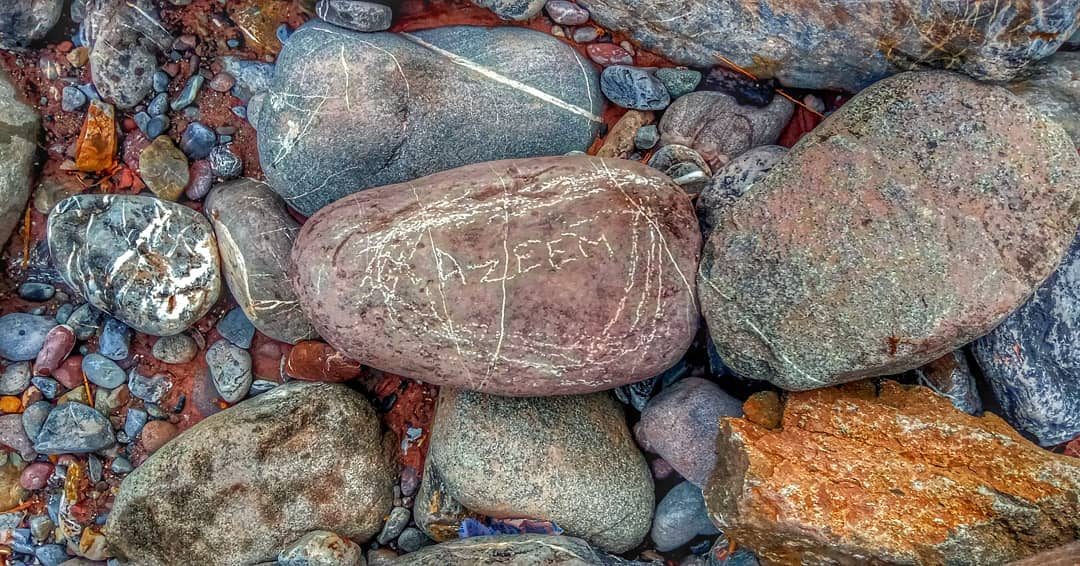 River Stones — nature photograph by Muhammad Azeem