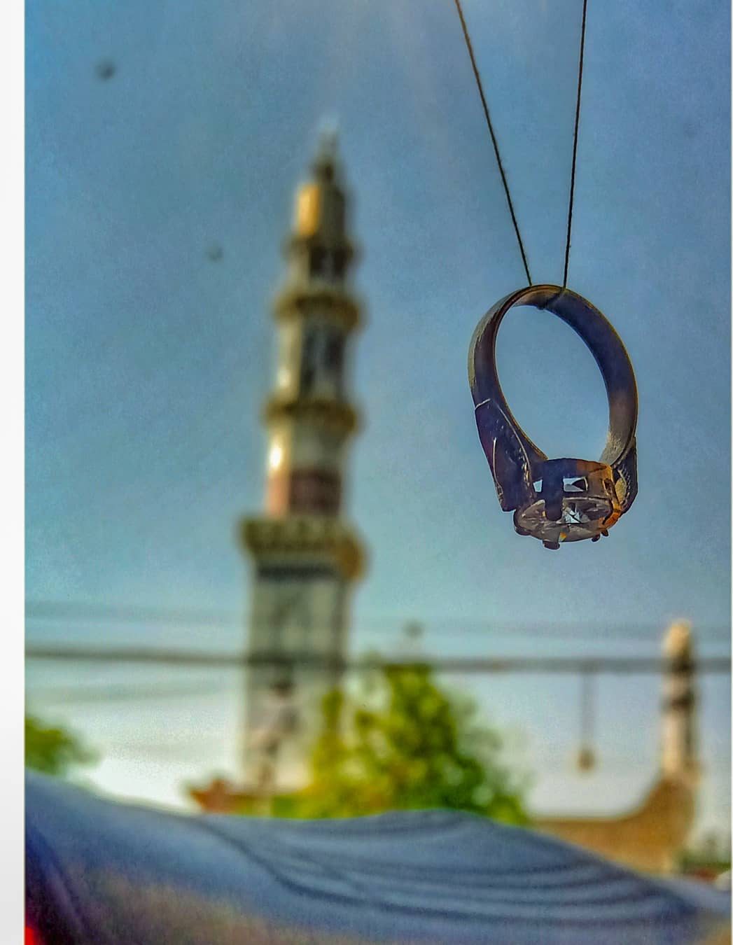 Ring and Minaret — macro photograph by Muhammad Azeem