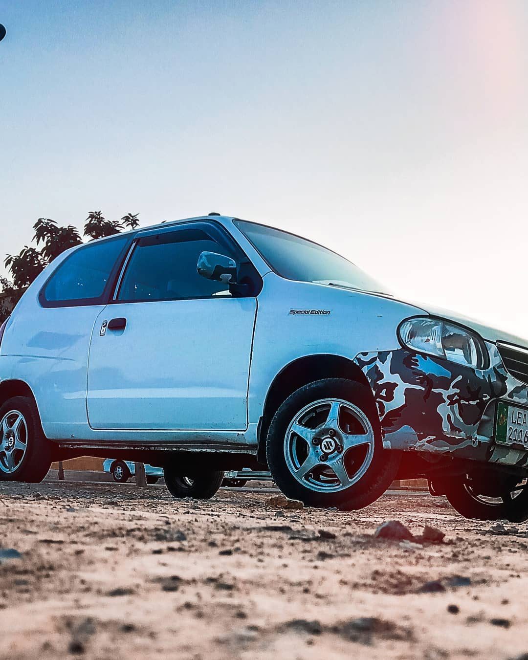 Parked on the Gravel — street photograph by Muhammad Azeem