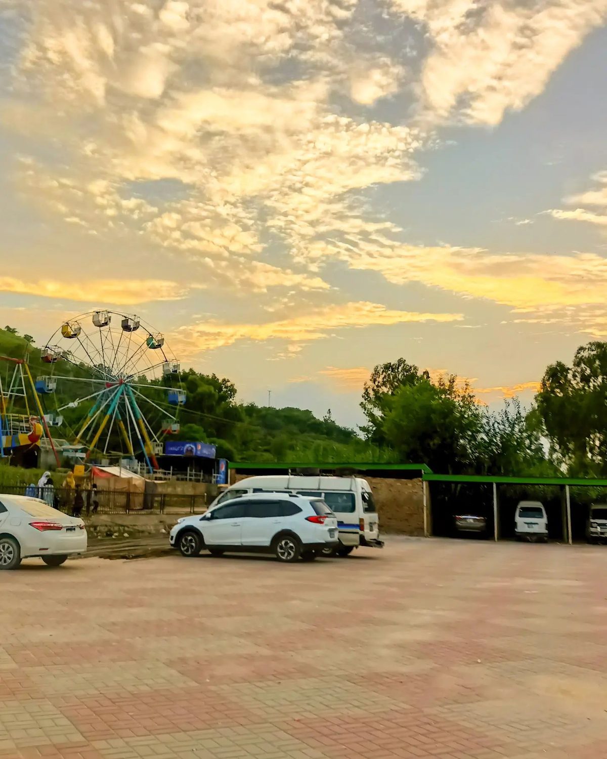 Fairground Evening — golden hour photograph by Muhammad Azeem