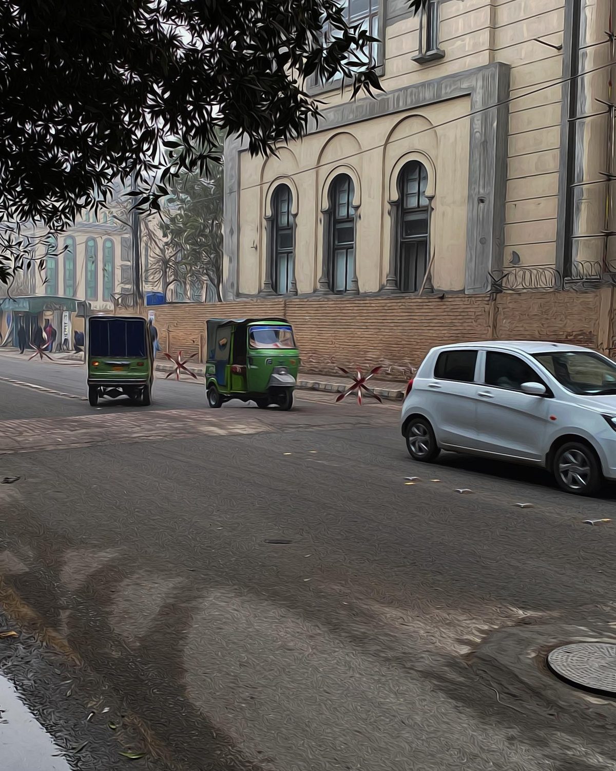 Rickshaw Row — street photograph by Muhammad Azeem